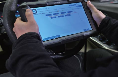 Technician holding VSSTA scanner